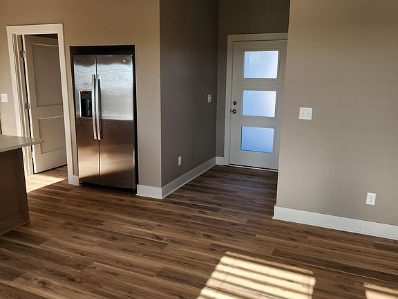 view from living room to front entry
