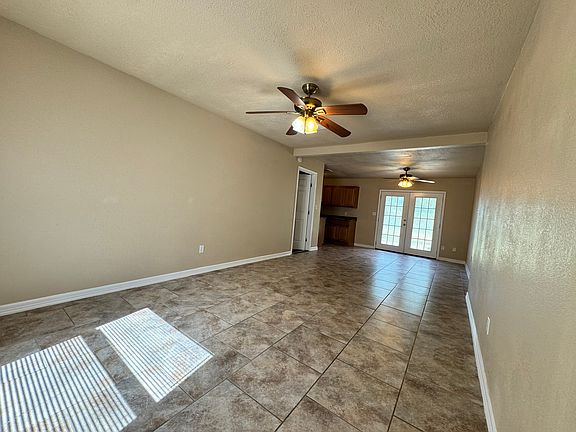 Living Room with view of dining area from front door.