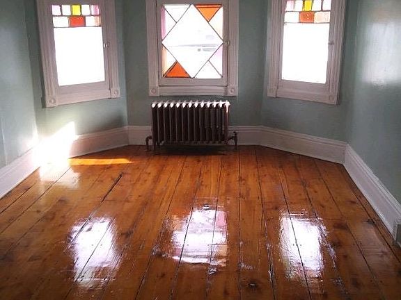 The Main Bedroom with stainglass windows offers a southern-facing view with great sunsets and sunrises