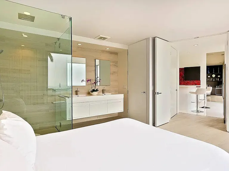 Indulge in the spacious in-room shower, promising a luxurious and refreshing experience.