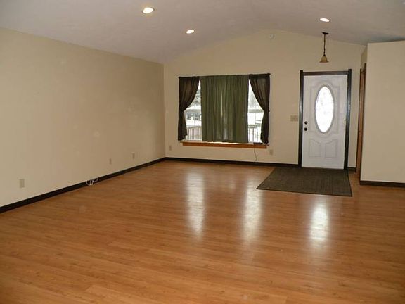 Living room, kithcne and dining all open to one another.