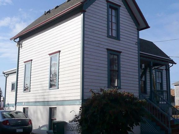 Front and south sides, and driveway.