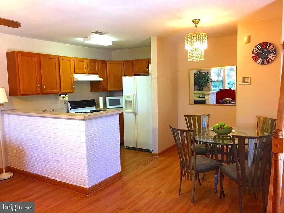 kitchen and dining area in front of the living room.