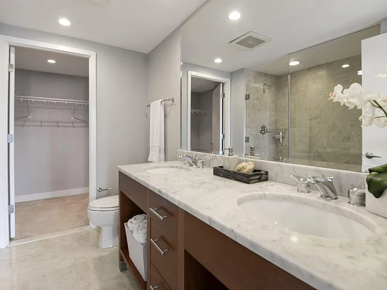 master bath view showing entrance to large walk in closet