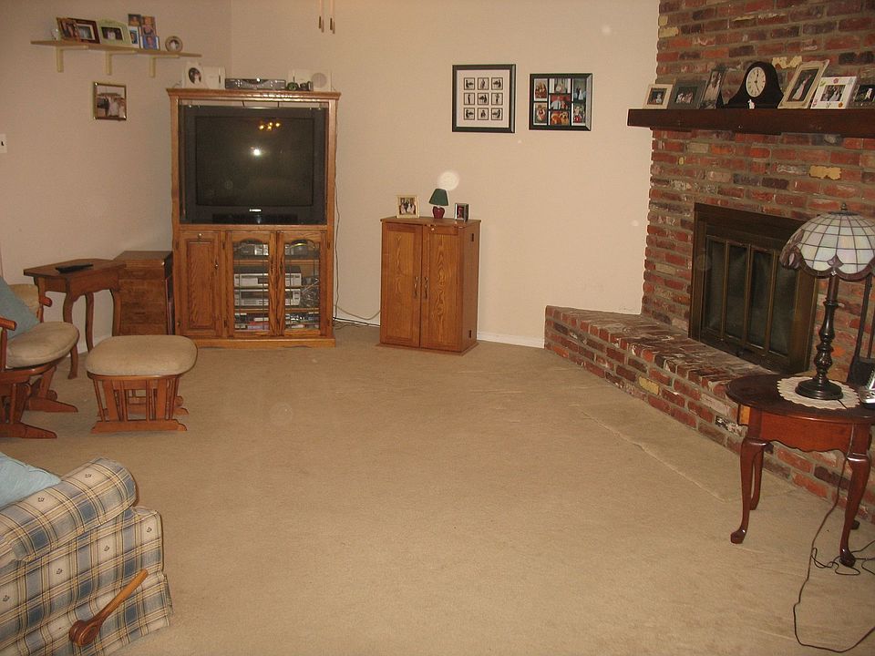 Corner Brick Fireplace in Family Room