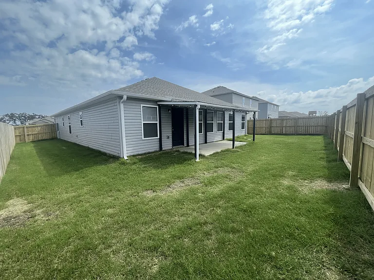 Back yard with the covered patio
