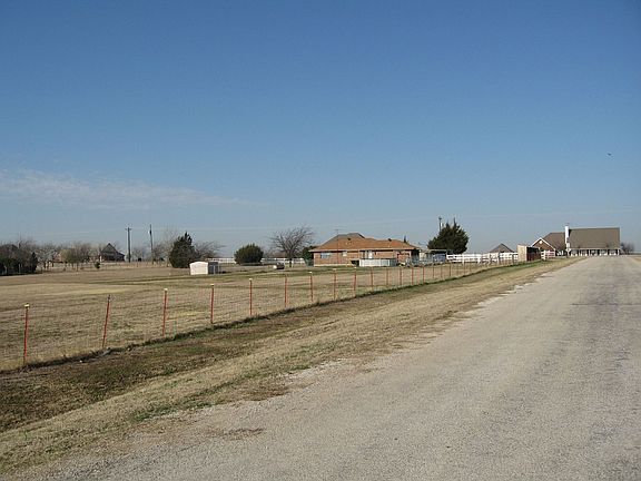 Property on corner or Union Hill & Muir; View from Muir towards house.