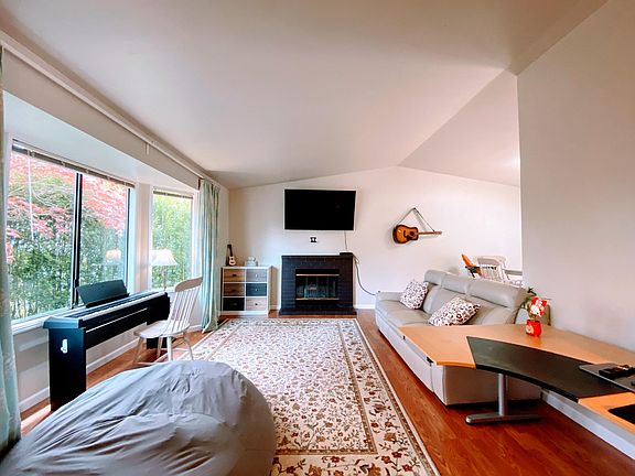 Living room with vaulted ceiling