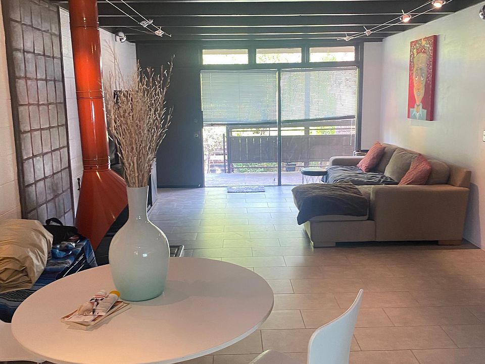 open concept living dining kitchen