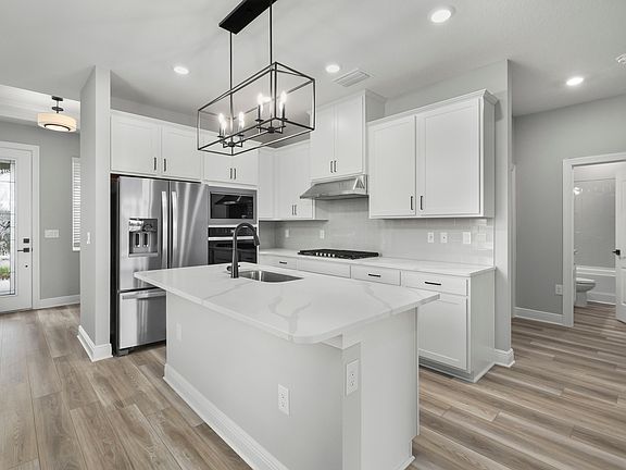 Incredible entertainment space and plenty of natural light are just a few highlights of this home