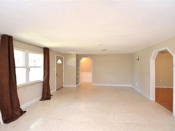 Living area with terrazzo flooring for easy care.
