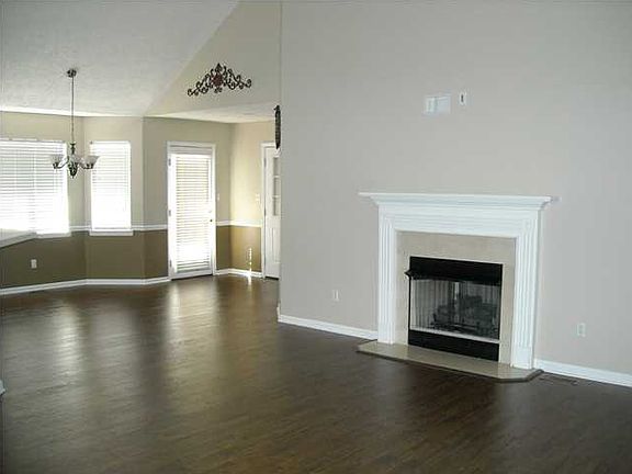 OPEN FLOOR PLAN...GREAT ROOM INTO DINING AREA AND KITCHEN