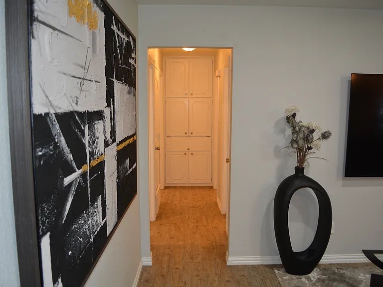 Unwind in a spacious, open-concept living room featuring plenty of comfortable seating meaning there is room for everyone to relax and make lasting memories together.