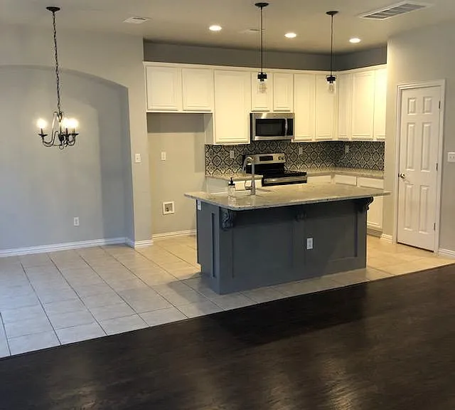 Cozy breakfast area just off the kitchen is a perfect place to enjoy a casual meal.