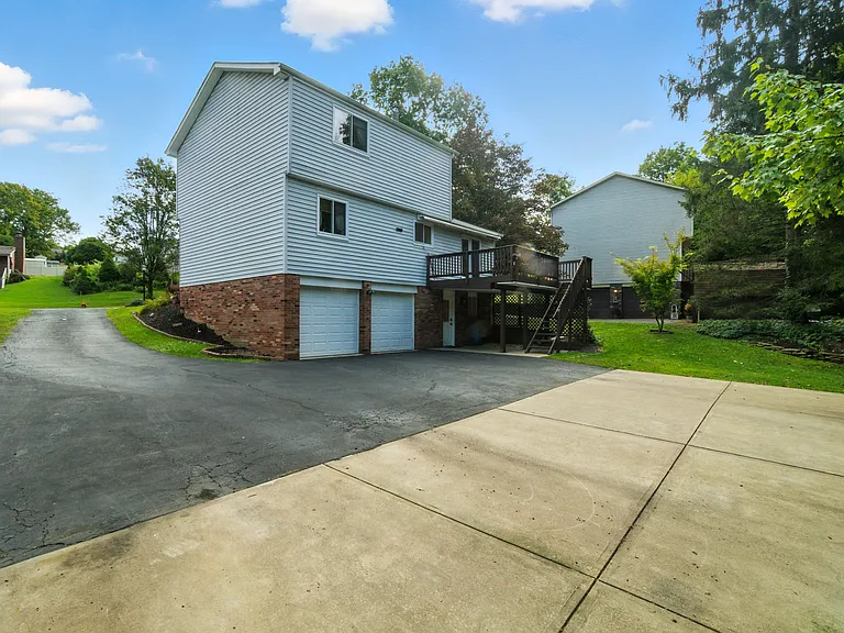Plenty of space for parking, with 2 car garage