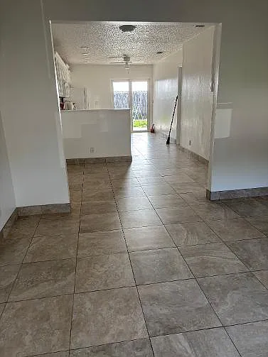 living room, looking into kitchen