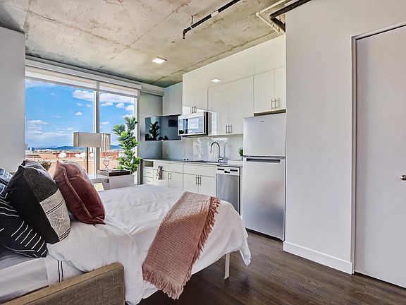 Furnished Studio. queen size bed electronic Murphy bed to Transform Your Space without having to move furniture!