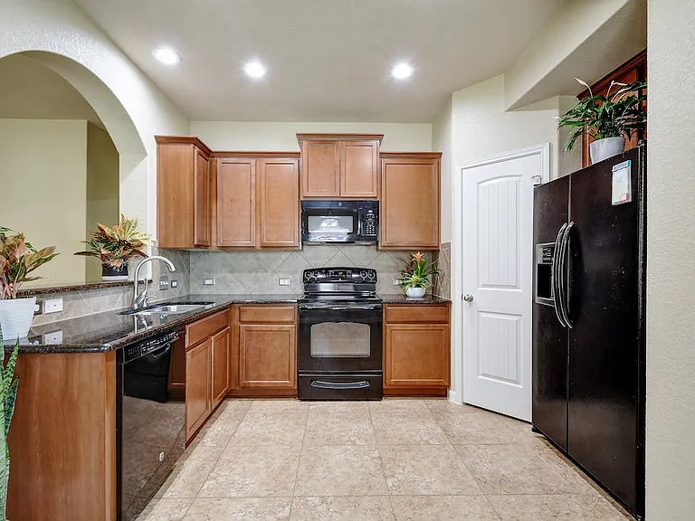 Garbage Disposal, Dishwasher, and a nice-sized pantry.