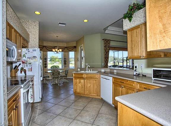 5th image of 7991 Tiger Palm Way