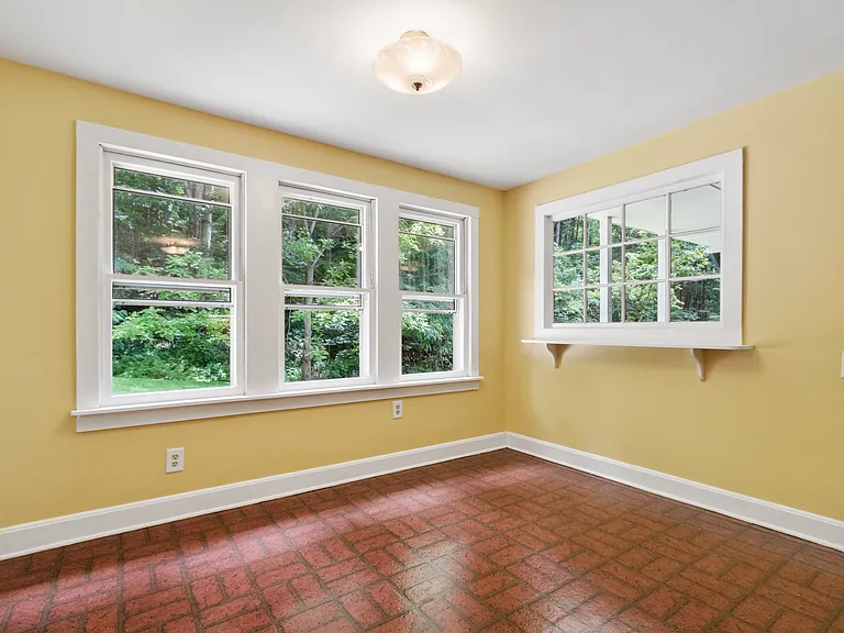 Spacious and sunny dining area next to kitchen.