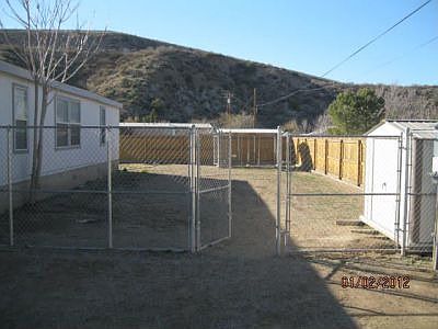 fenced backyard with dog run