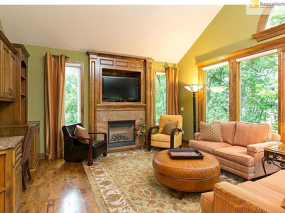 Hearth room. Motorized Hunter Douglas blinds in this room as well as basement and great room.