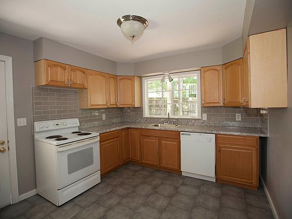 New counter top, bottom cabinets, floor and backsplash