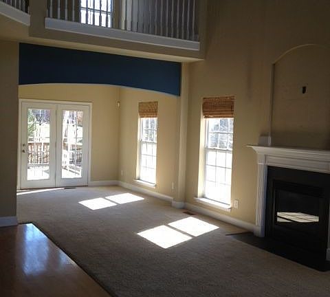 From the entry, you can see the great room, dining room and loft above