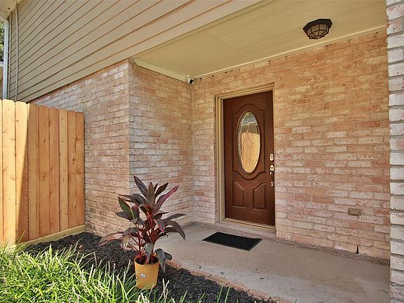 Welcoming front porch. Portions of back yard fence have been recently replaced.
