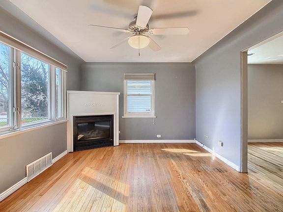 Bright living room with gas fireplace