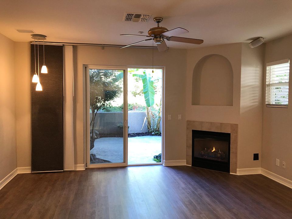 Family room area with decorative fireplace