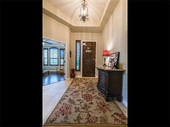 Grand entrance with high ceilings makes a statement as you first walk in.