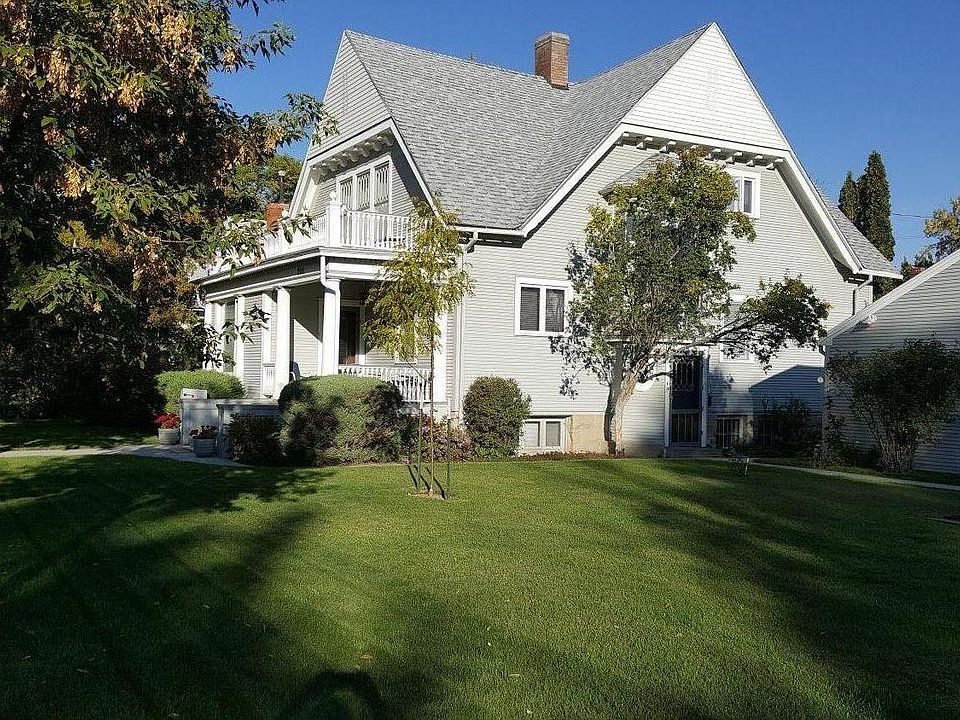 Outside of house with front porch.