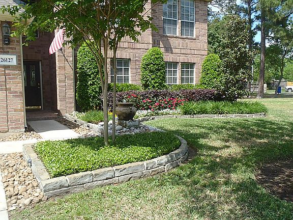 Great curb appeal with lush landscaping