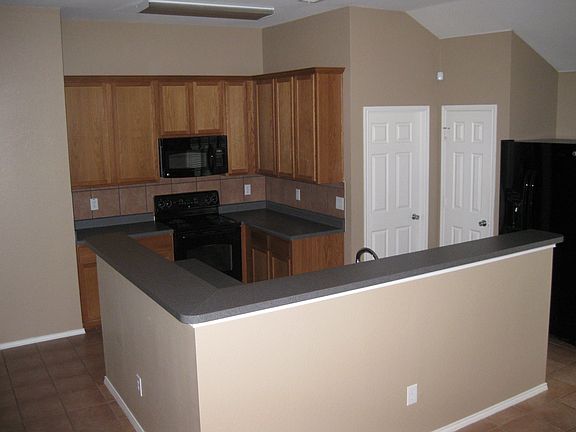 Kitchen appliances included.
