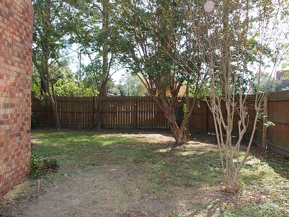 Partial backyard/side view