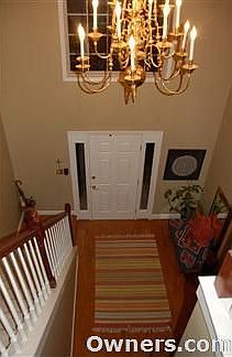 View to the foyer from the top of stairs