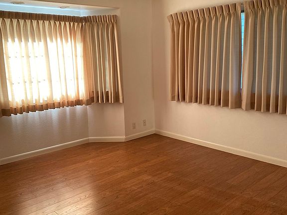 The master bedroom has a walk in closet and bathroom.