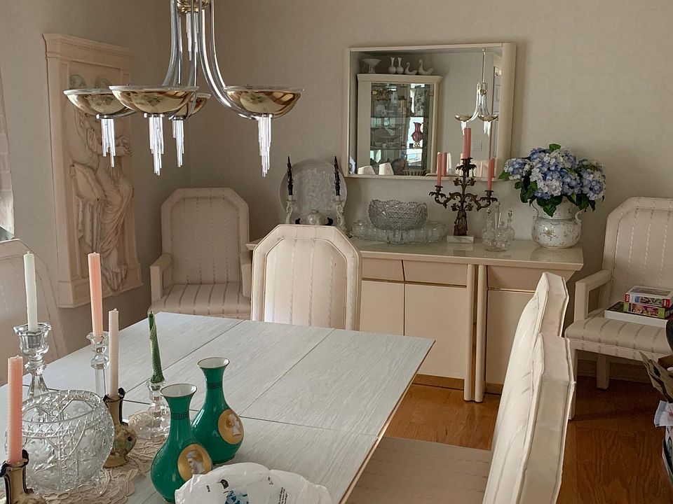 Dining room. Chairs have been recovered
