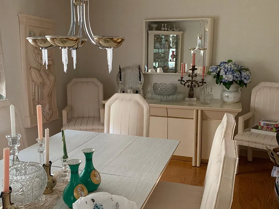 Dining room. Chairs have been recovered