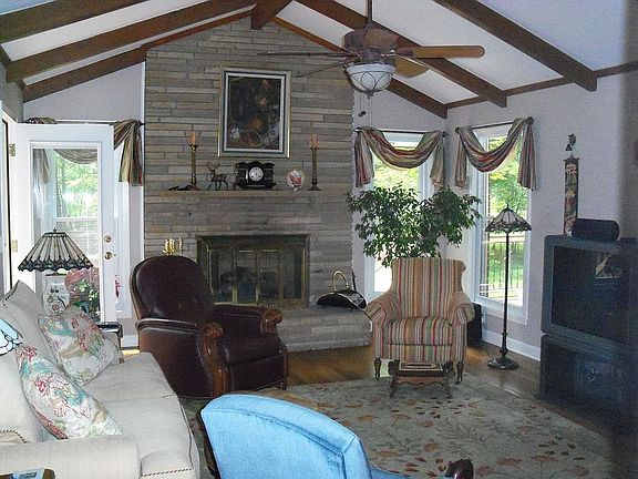 Family Room with cathedral ceilings and fireplace