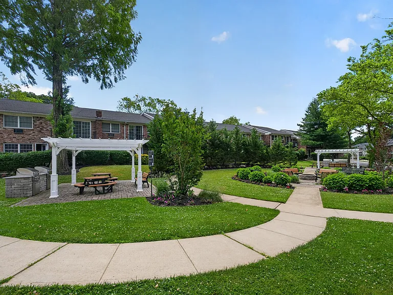 Embrace tranquil living at Eagle Rock Apartments at Woodbury. Enjoy beautifully landscaped grounds, perfect for relaxation and gatherings. Elevate your lifestyle in a serene environment. Schedule a tour today and see what awaits!