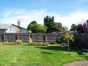 Private fenced backyard