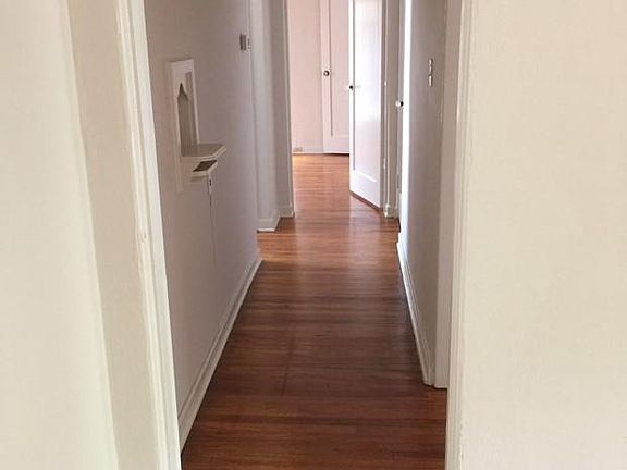 Hallway to bedrooms and bathroom