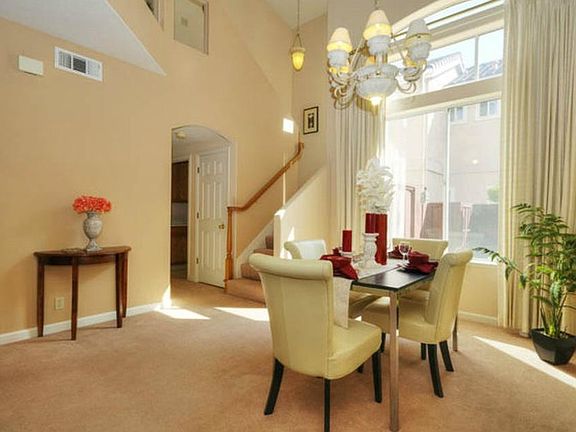 Large and airy living/dining room with lots of natural light pouring in all through the day