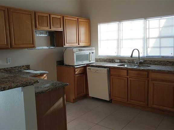 5th image of 909 Tena Ave N