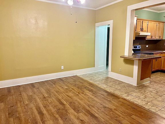Dining area open to kitchen. Freshly painted