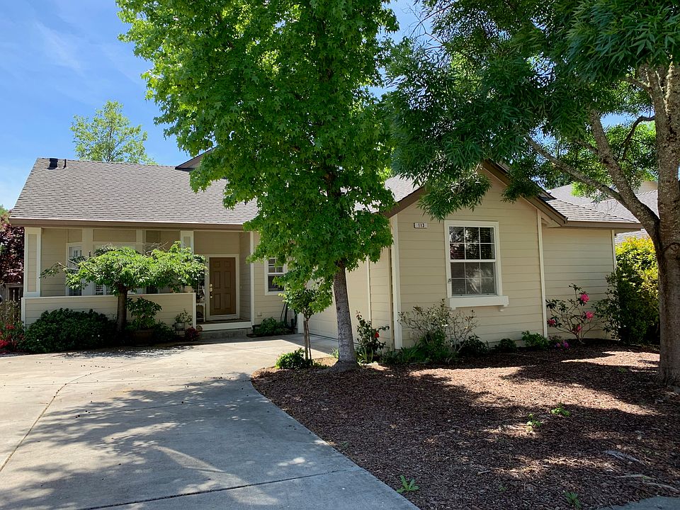 Front view, lrg shade trees 