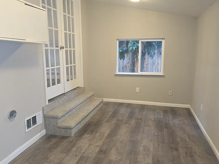 Extra Covered area with rear door to backyard