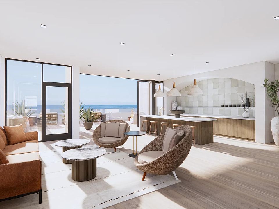 Sky lounge with private dining space and rooftop terrace with panoramic ocean views.